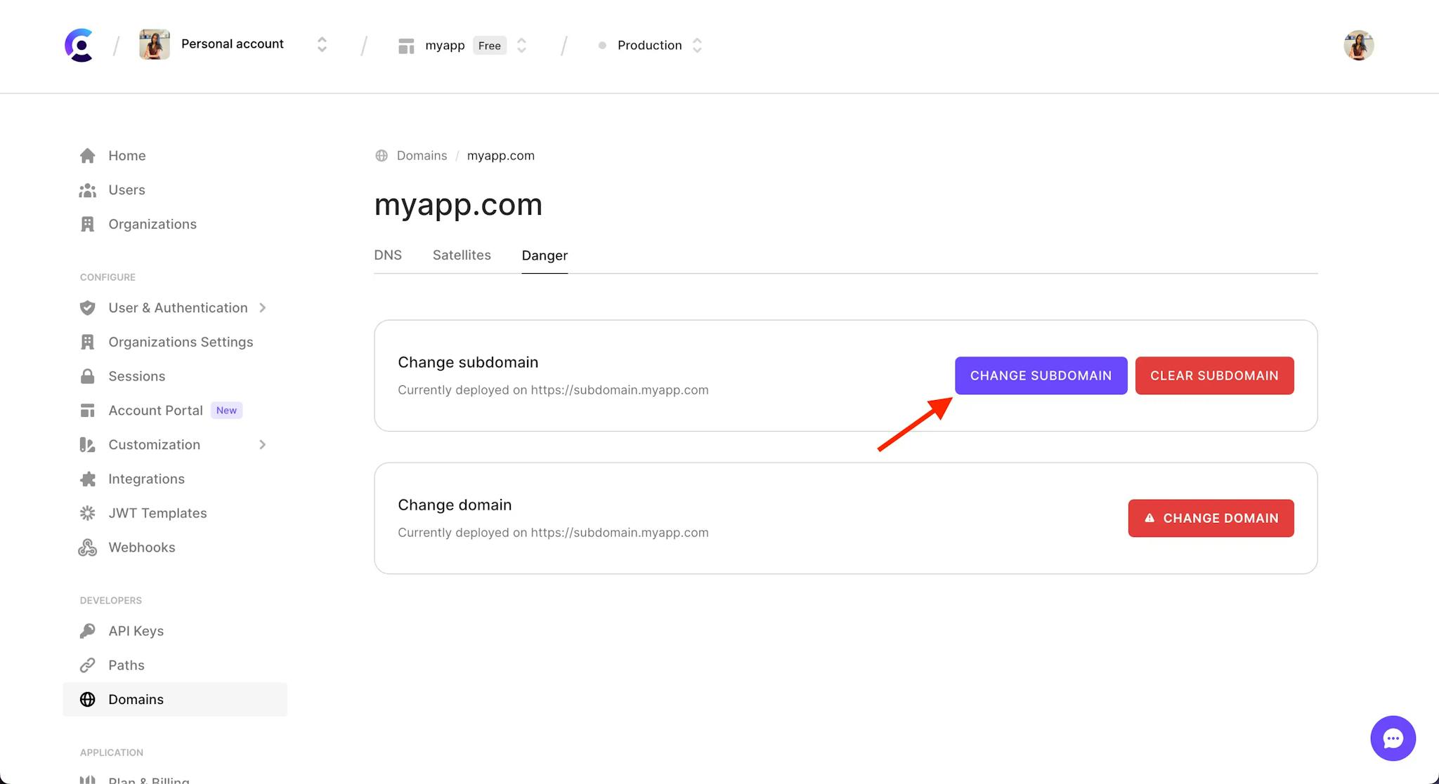 The 'Danger' tab of the Domains page in the Clerk Dashboard.There is a red arrow pointing to the 'Change subdomain' button.